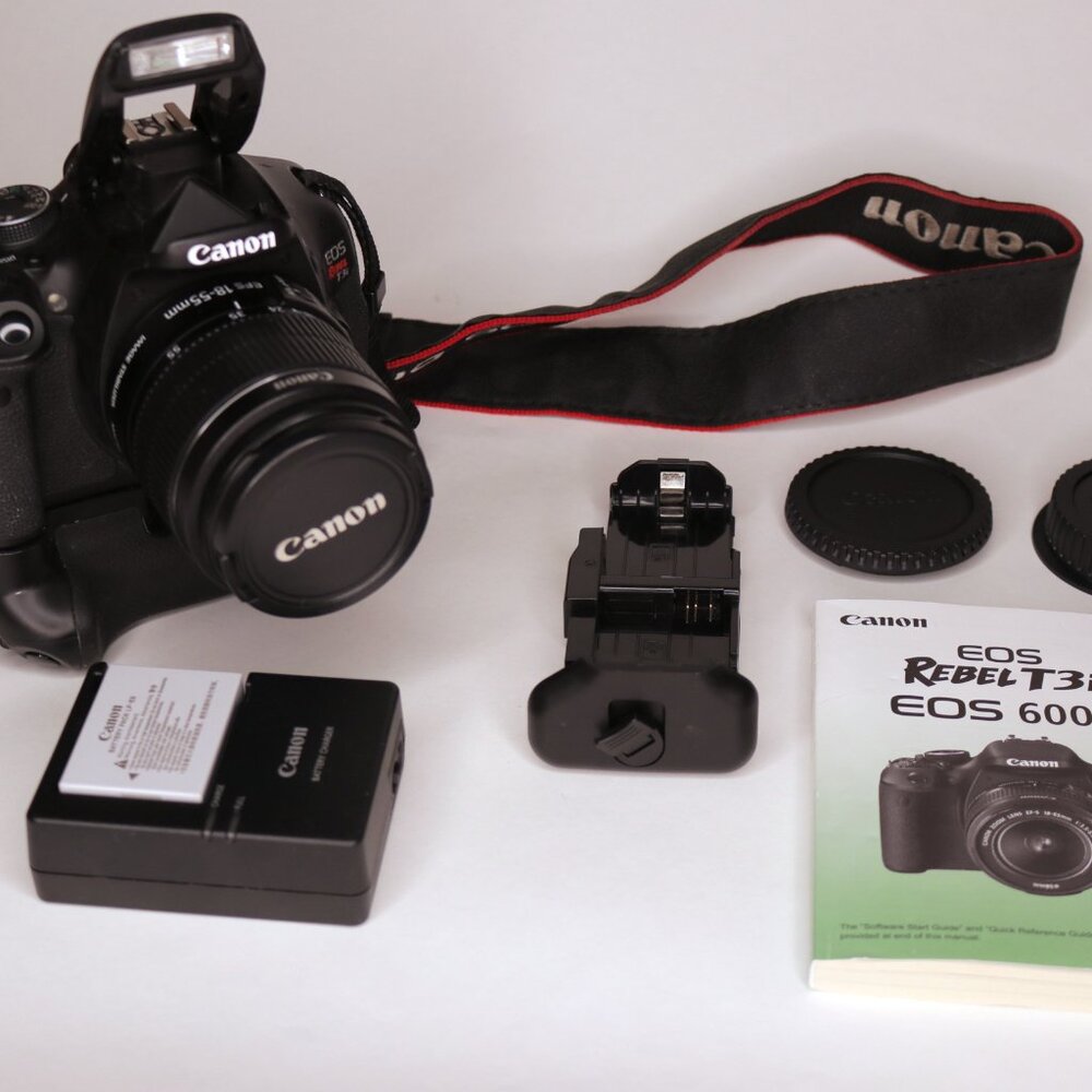 Canon EOS T3i 600D + Lens + Battery Grip + Memory Card & more